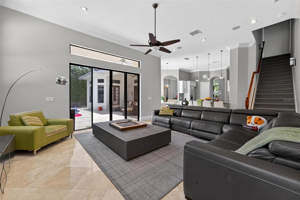 11015 Hawkshead Court Windermere, FL 34786 - Photo 56 of 90 a living room with furniture and a large window