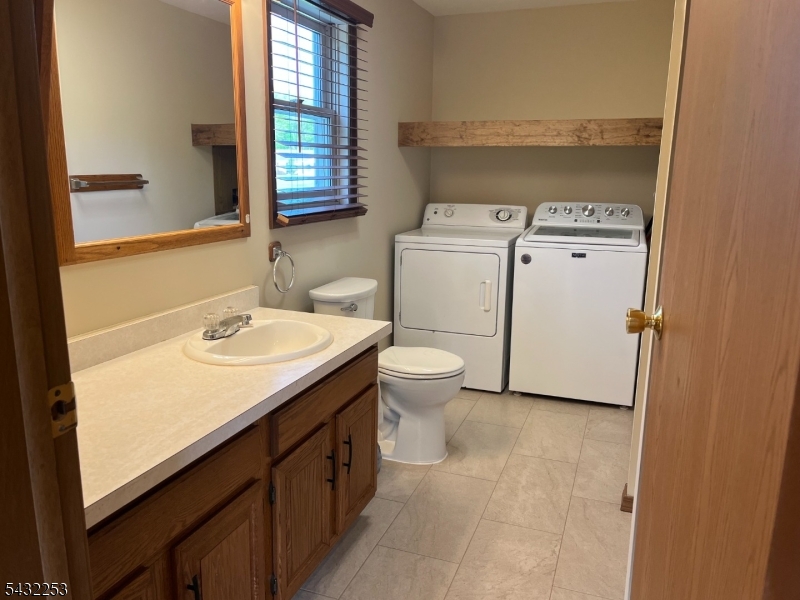 31 Countryside Road Columbia, NJ 07832 - Photo 8 of 31 a utility room with dryer and washer