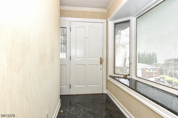 a view of a room with a large window