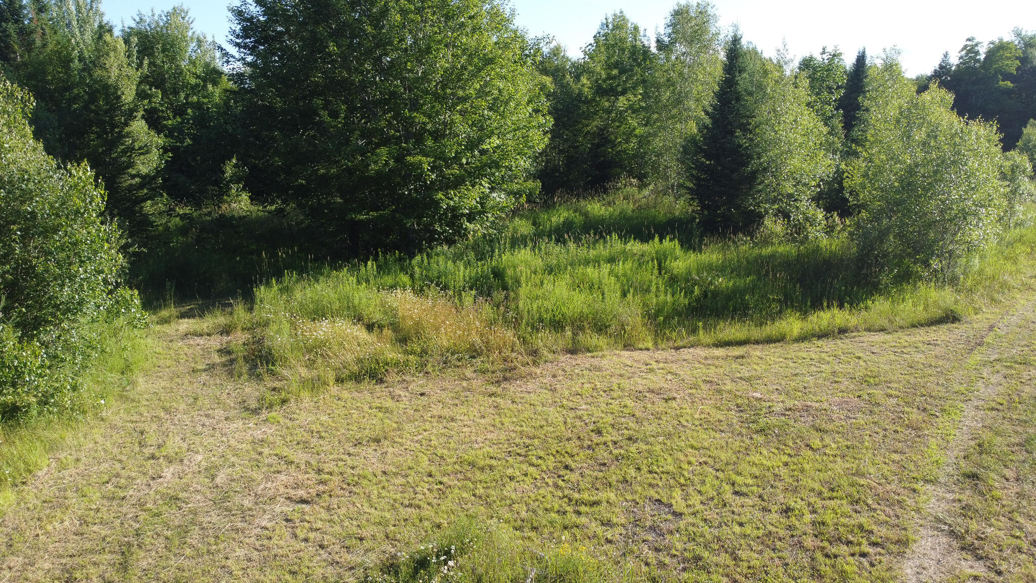 171 Reed Plt Me 04497 Wytopitlock, ME 04497 - Photo 2 of 29 dji_fly_20260716_175220_736_178423878476