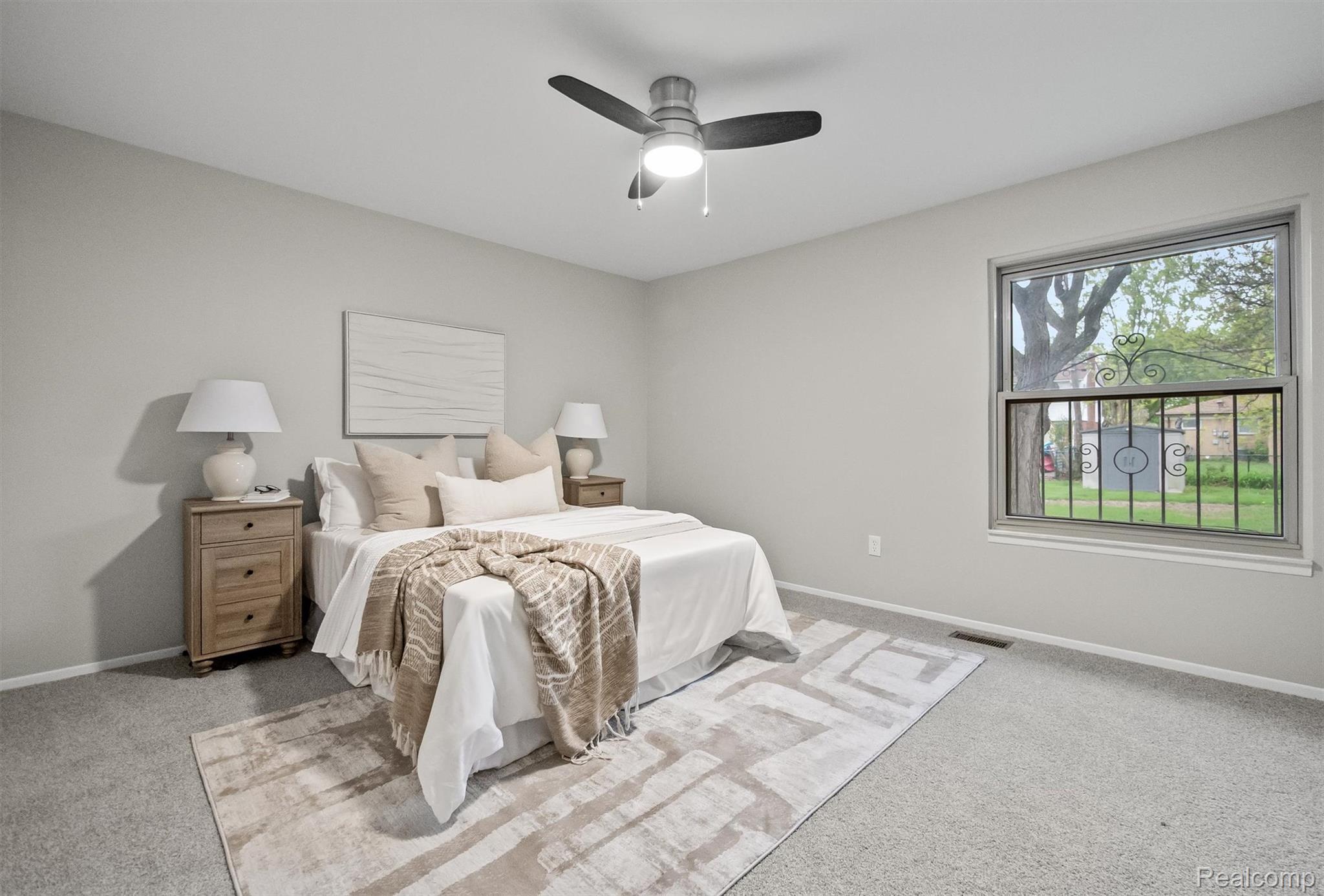 11326 Common Road Warren, MI 48093 - Photo 26 of 35 Bedroom featuring a ceiling fan and light carpet