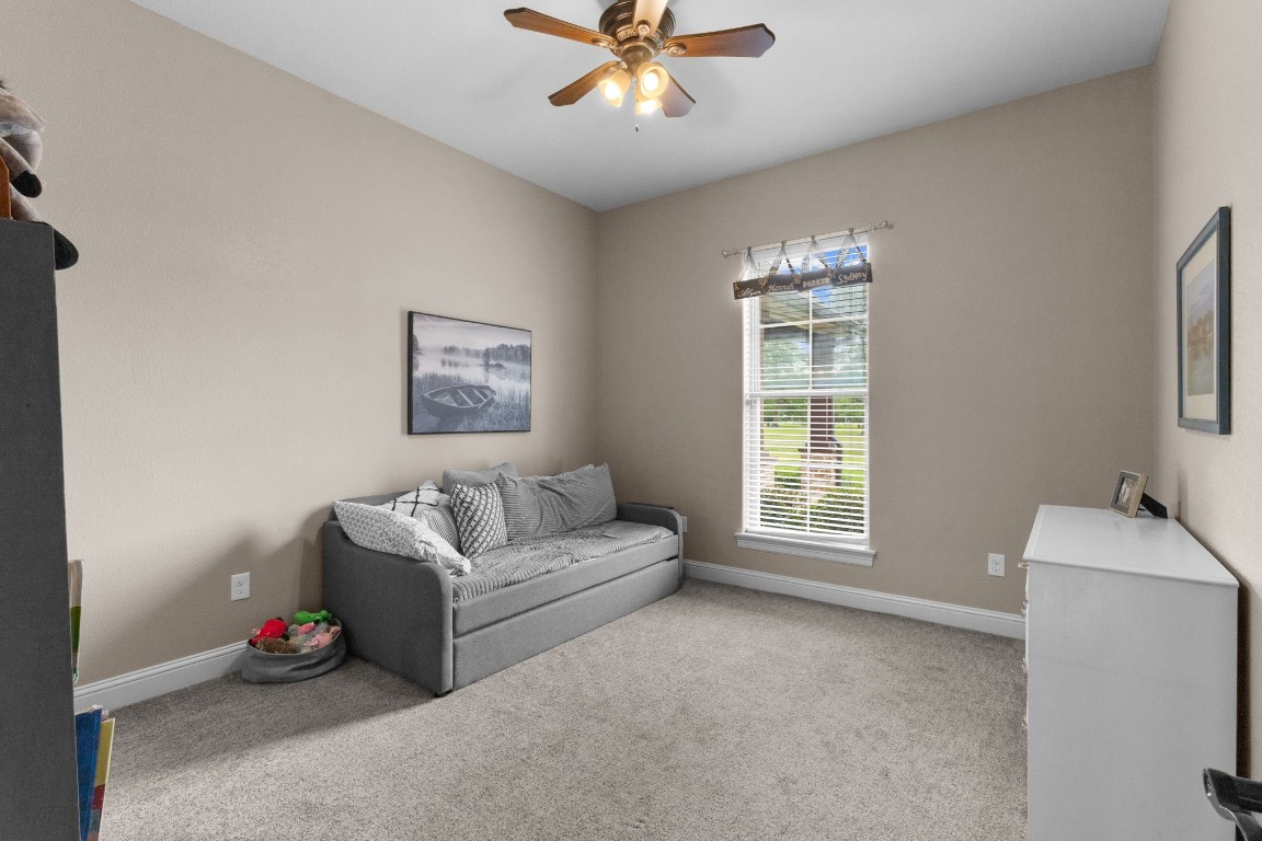 5535 Bearfoot Road Orange, TX 77632 - Photo 26 of 50 a living room with furniture and a window