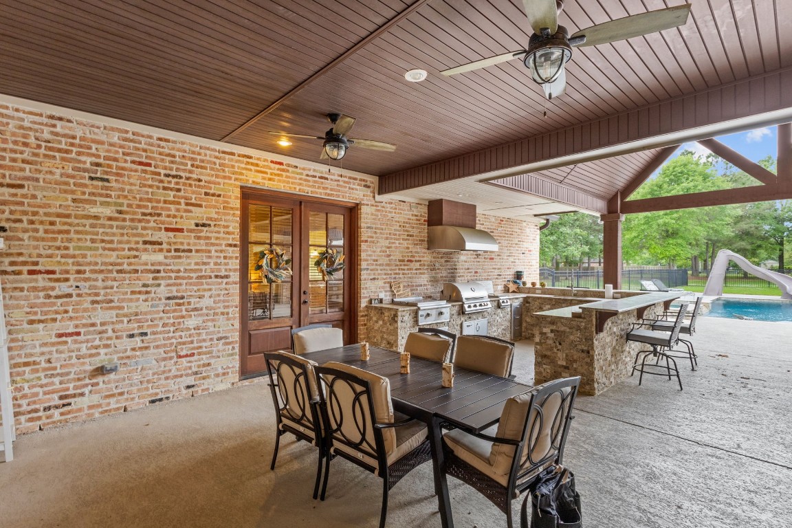 5535 Bearfoot Road Orange, TX 77632 - Photo 36 of 50 a view of a dining room with furniture window and outside view