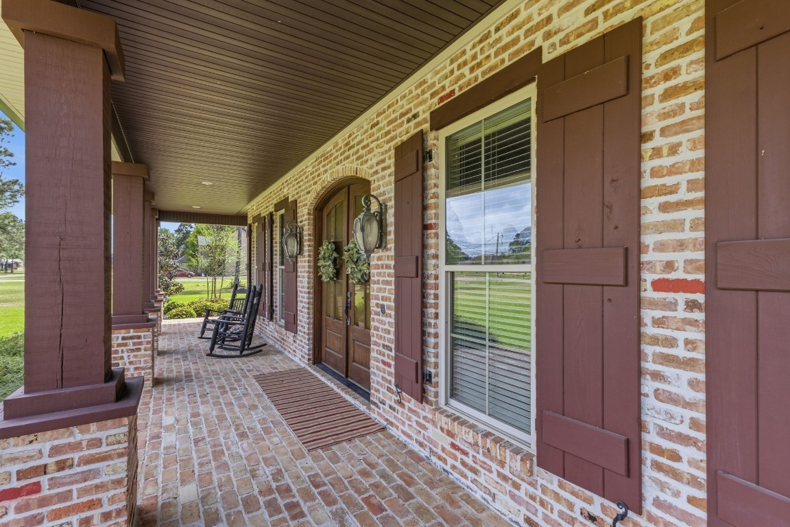 5535 Bearfoot Road Orange, TX 77632 - Photo 4 of 50 a view of a chairs and table in the balcony