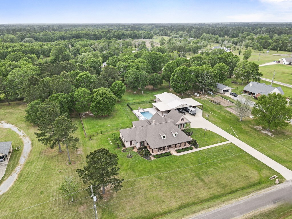 5535 Bearfoot Road Orange, TX 77632 - Photo 48 of 50 a view of a lake with a yard