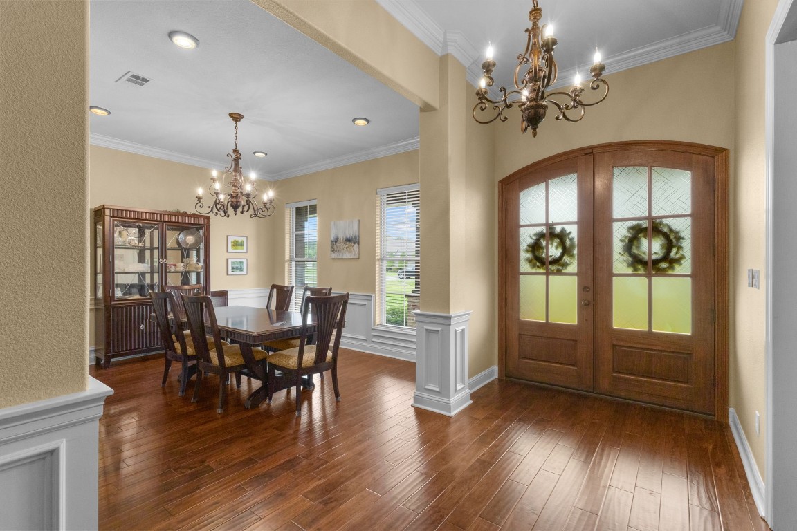 5535 Bearfoot Road Orange, TX 77632 - Photo 6 of 50 a view of a dining room with furniture window and wooden floor