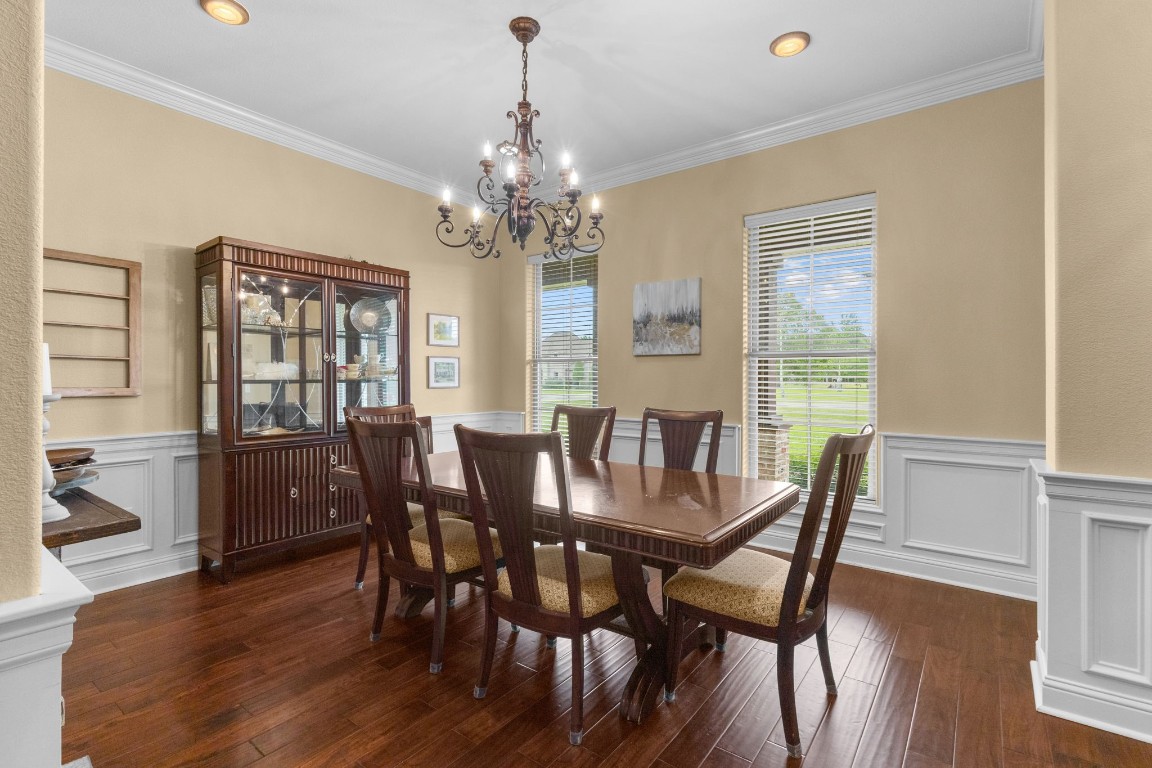 5535 Bearfoot Road Orange, TX 77632 - Photo 7 of 50 a view of a dining room with furniture window and wooden floor