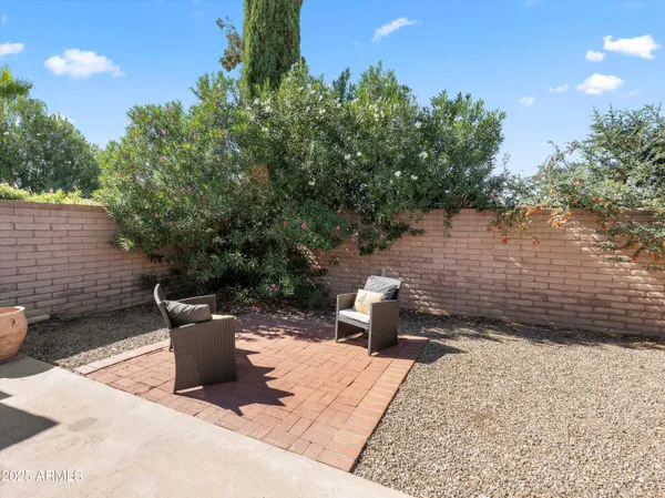 a view of a terrace with furniture