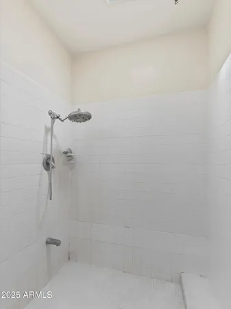 a bathroom with a sink a vanity and a bathtub