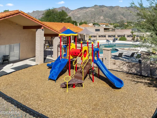 a view of a park with furniture