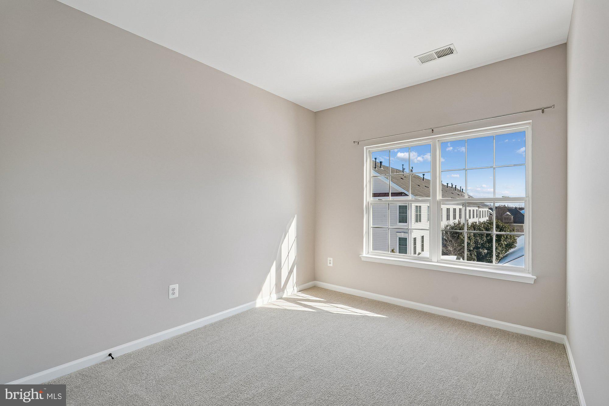 22982 Fox Fire Terrace Brambleton, VA 20148 - Photo 34 of 50 a view of an empty room with a window