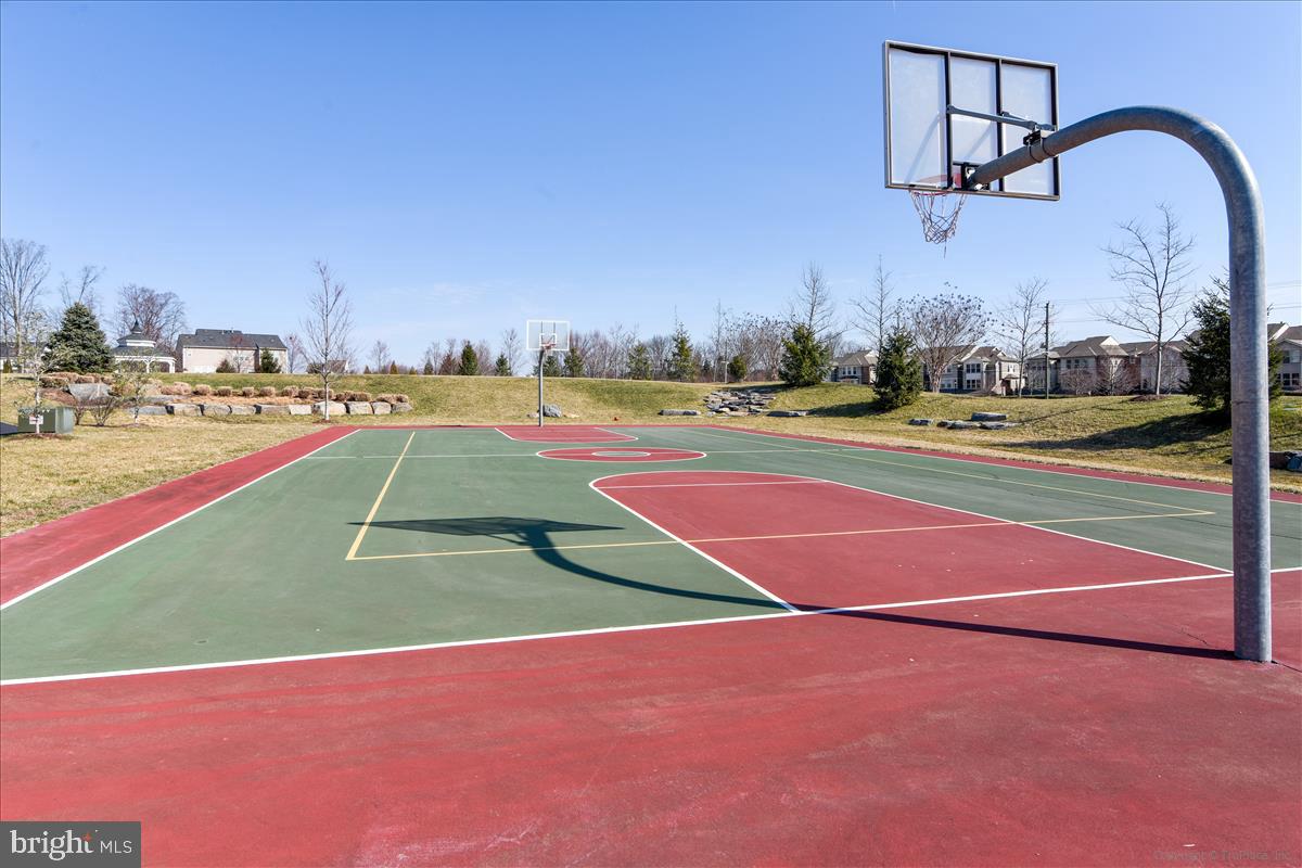 22982 Fox Fire Terrace Brambleton, VA 20148 - Photo 40 of 50 a view of a tennis court