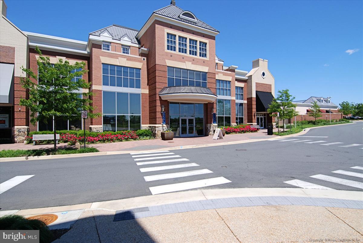 22982 Fox Fire Terrace Brambleton, VA 20148 - Photo 44 of 50 a front view of a building with street view
