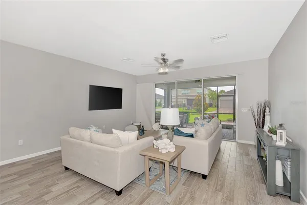 a living room with furniture and a table