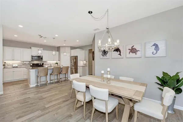 a view of a dining room with furniture