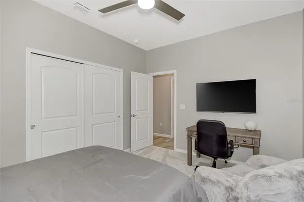 a bathroom with a shower and a sink