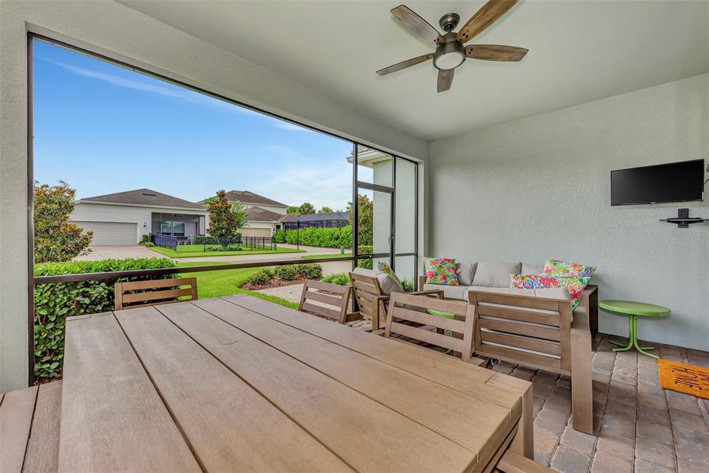 11616 Golden Bay Place Lakewood Ranch, FL 34211 - Photo 44 of 66 a room with pool table and flat screen tv