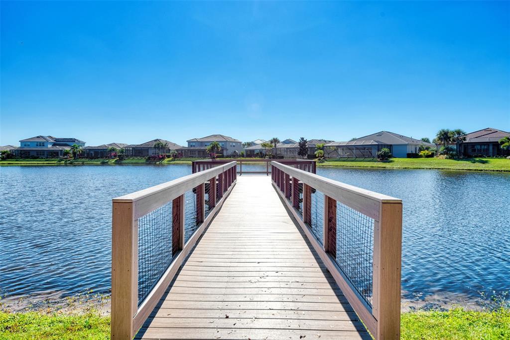 11616 Golden Bay Place Lakewood Ranch, FL 34211 - Photo 51 of 66 a view of a lake with a ocean view