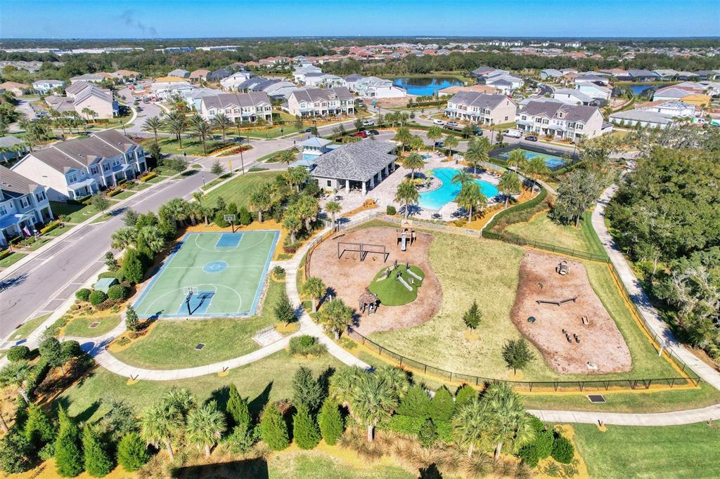 11616 Golden Bay Place Lakewood Ranch, FL 34211 - Photo 53 of 66 an aerial view of residential houses with outdoor space