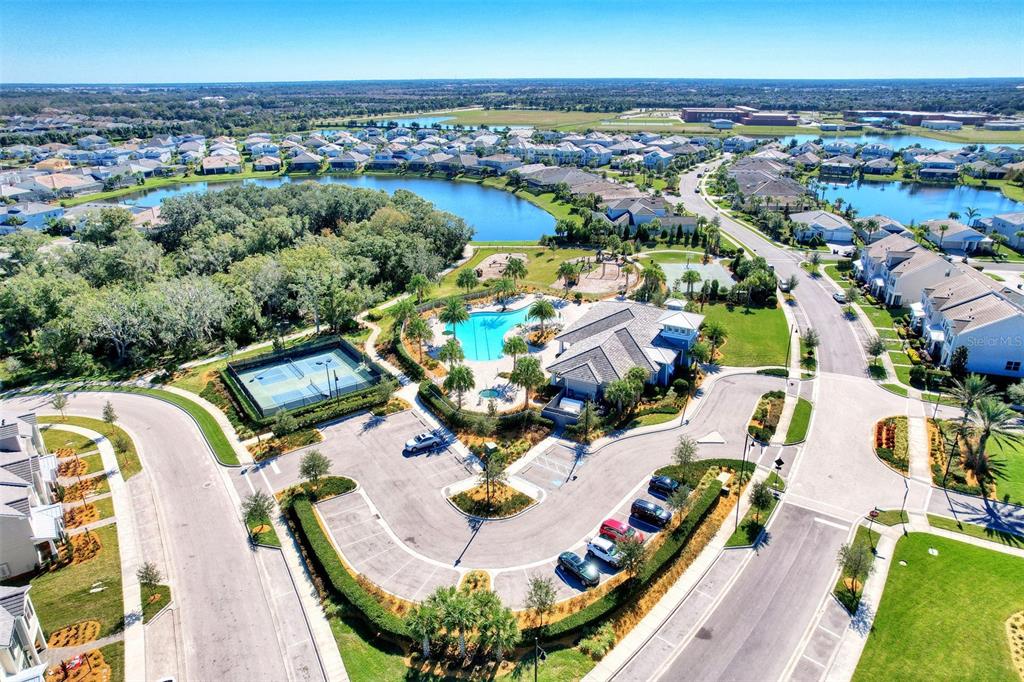 11616 Golden Bay Place Lakewood Ranch, FL 34211 - Photo 55 of 66 an aerial view of a house with a swimming pool yard and outdoor seating