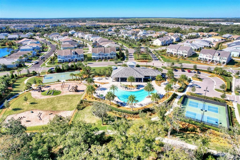 11616 Golden Bay Place Lakewood Ranch, FL 34211 - Photo 57 of 66 an aerial view of residential houses with outdoor space