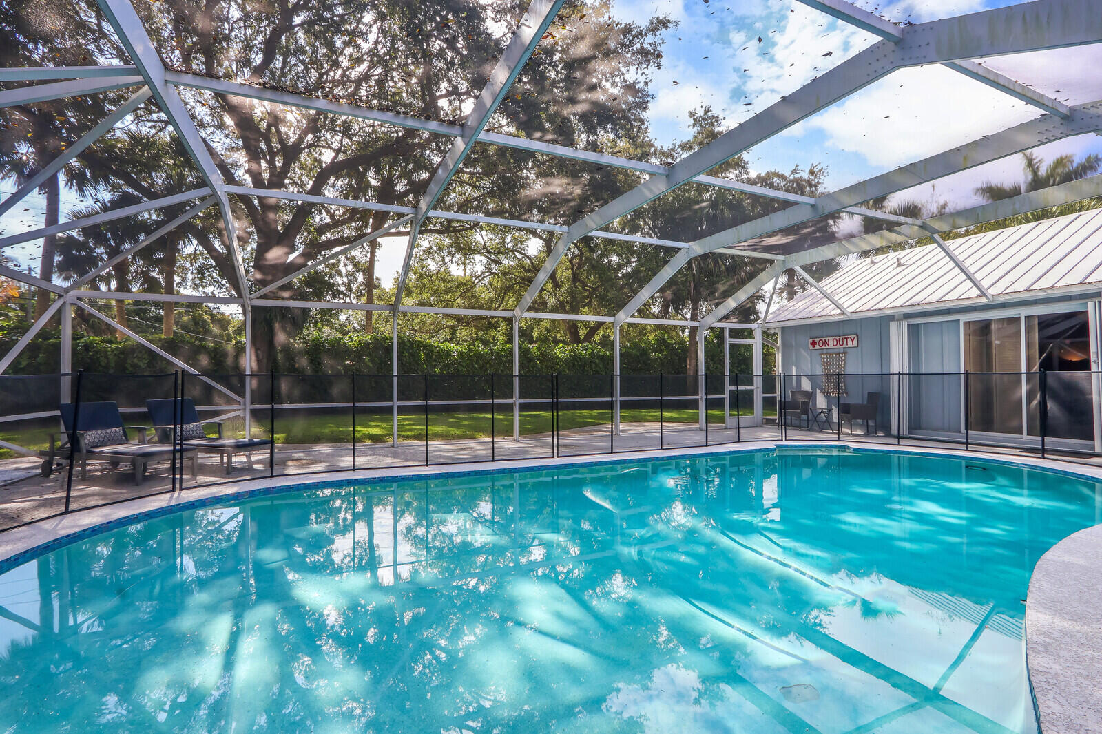 5760 Senegal Drive Jupiter, FL 33458 - Photo 35 of 51 Screened Enclosed Pool Area