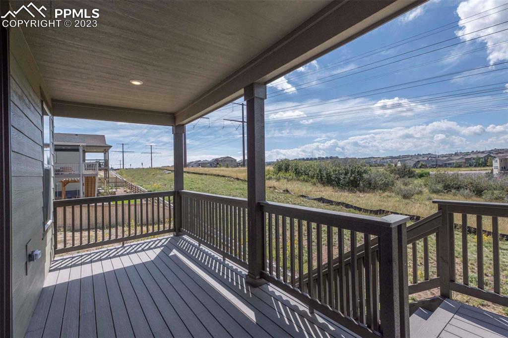 2036 Peachleaf Loop Castle Rock, CO 80108 - Photo 34 of 35 a view of balcony with wooden floor