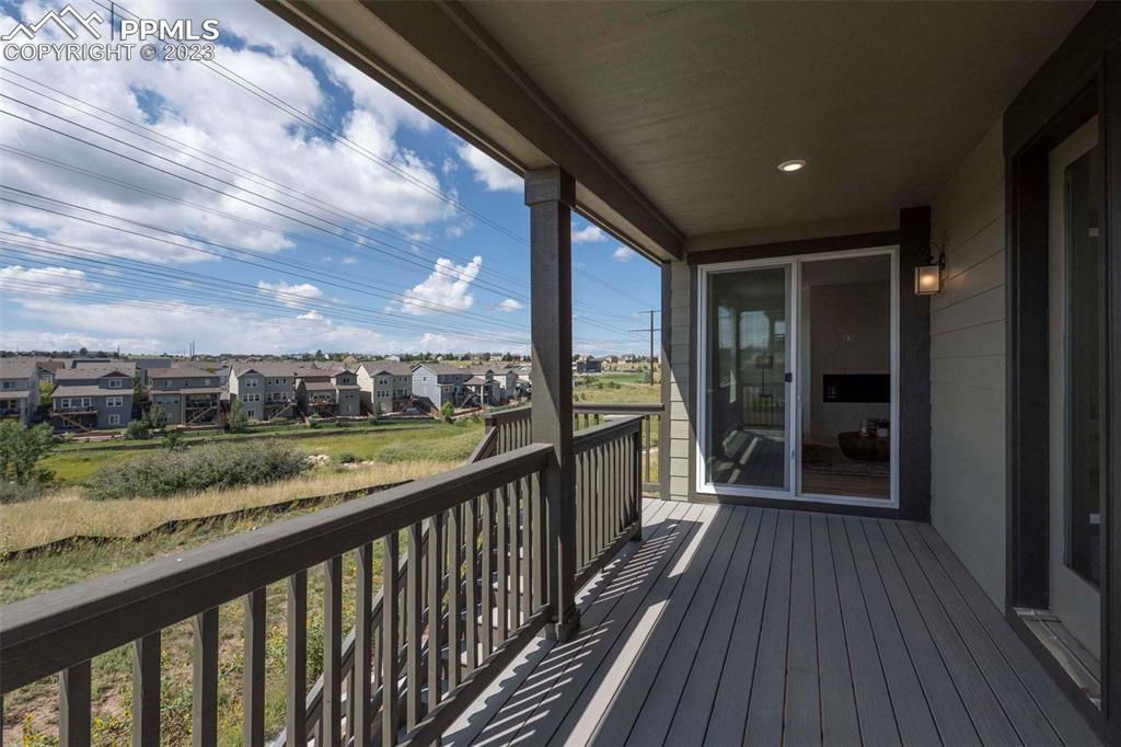 2036 Peachleaf Loop Castle Rock, CO 80108 - Photo 35 of 35 a view of a balcony with wooden floor