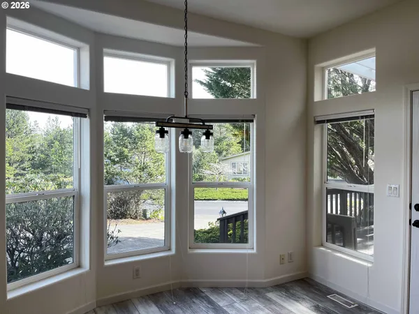a view of an entryway with sitting area