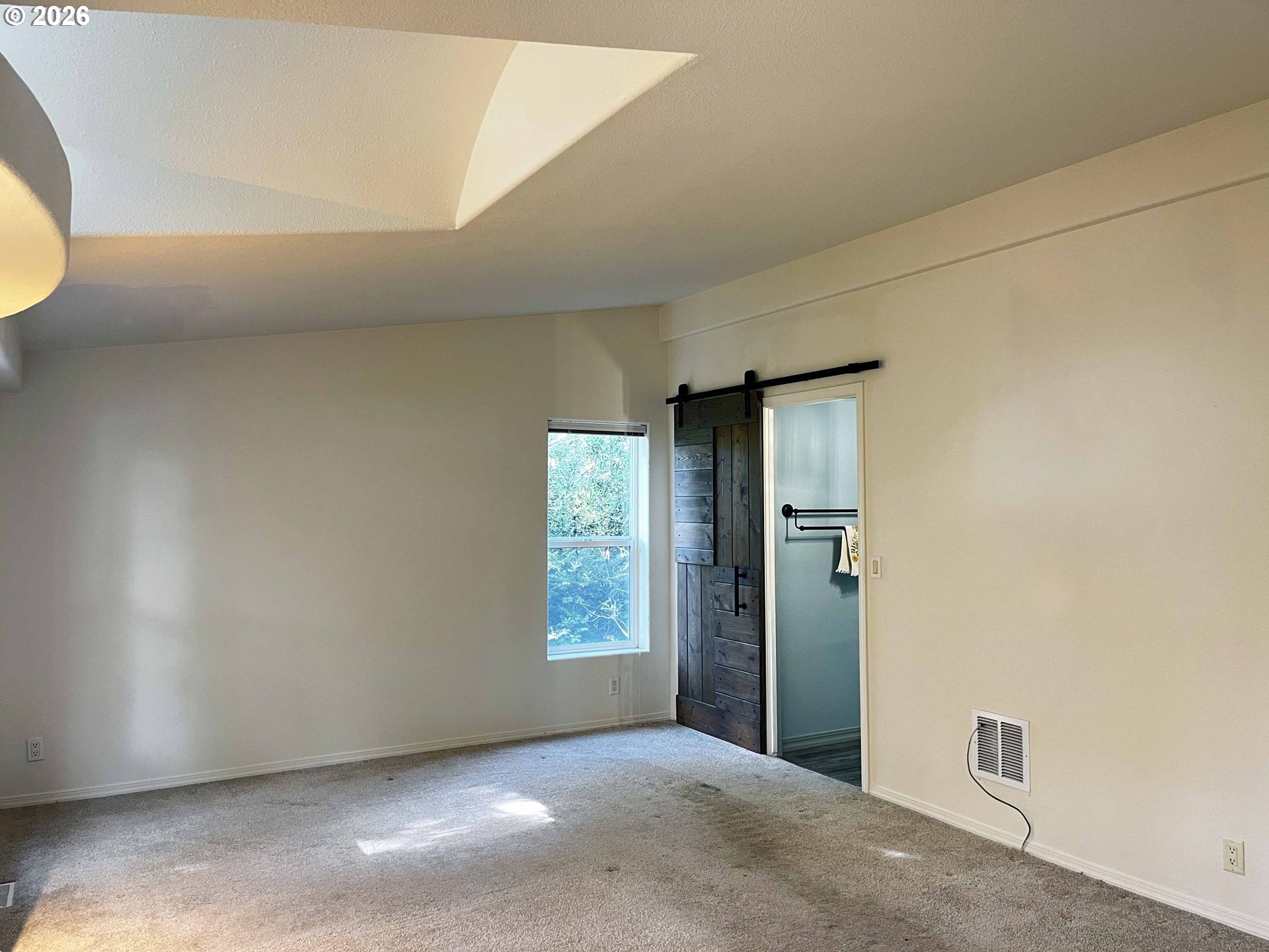 614 38th Place Florence, OR 97439 - Photo 24 of 48 an empty room with windows and entrance