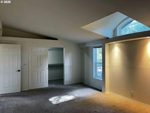 an empty room with windows