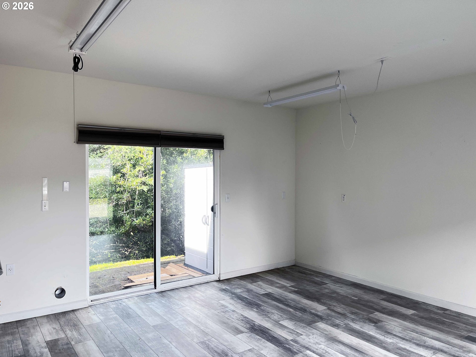 614 38th Place Florence, OR 97439 - Photo 43 of 48 a view of an empty room with window