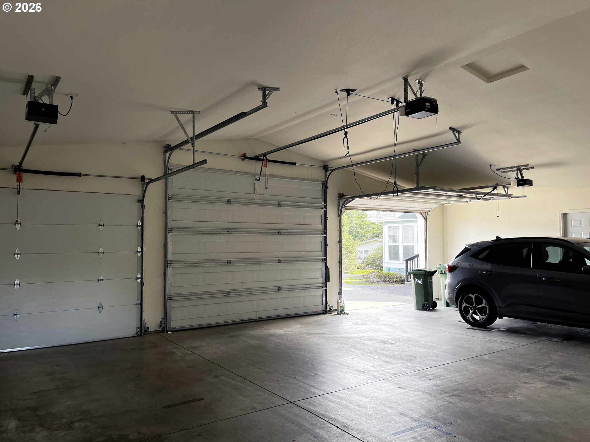 614 38th Place Florence, OR 97439 - Photo 47 of 48 a car parked in a garage