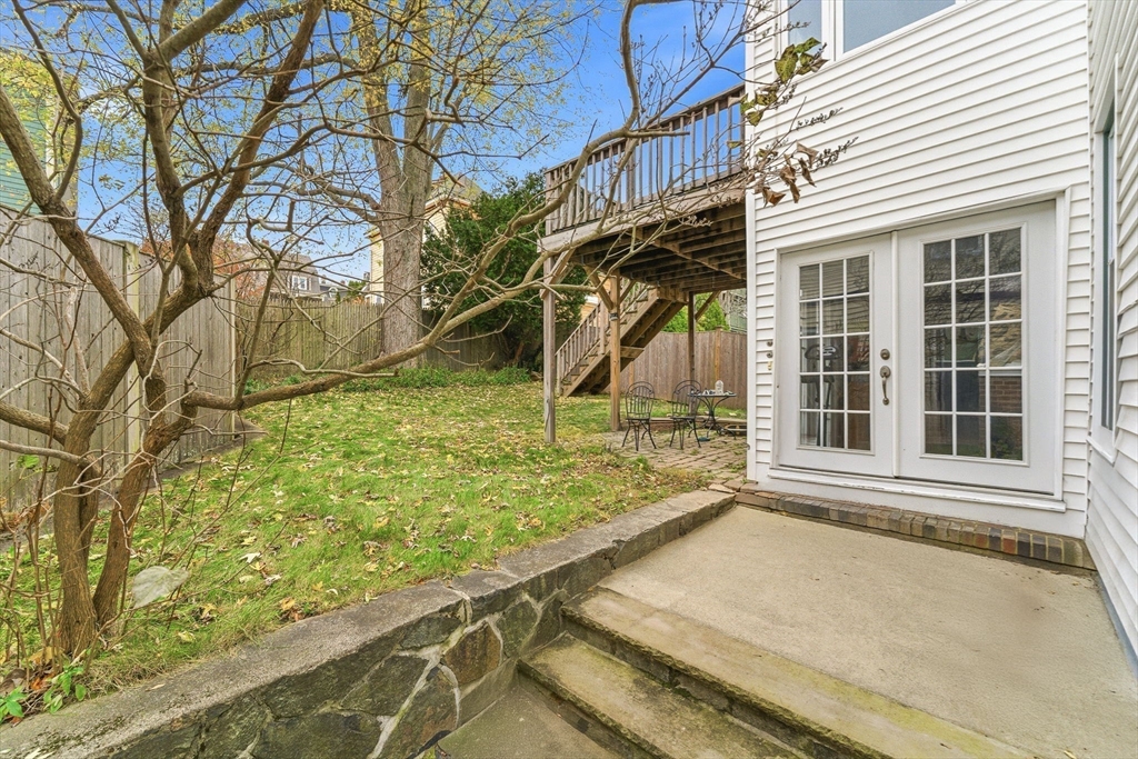 29-31 Essex Avenue, Unit 2 Swampscott, MA 01907 - Photo 20 of 22 a view of a house with a yard