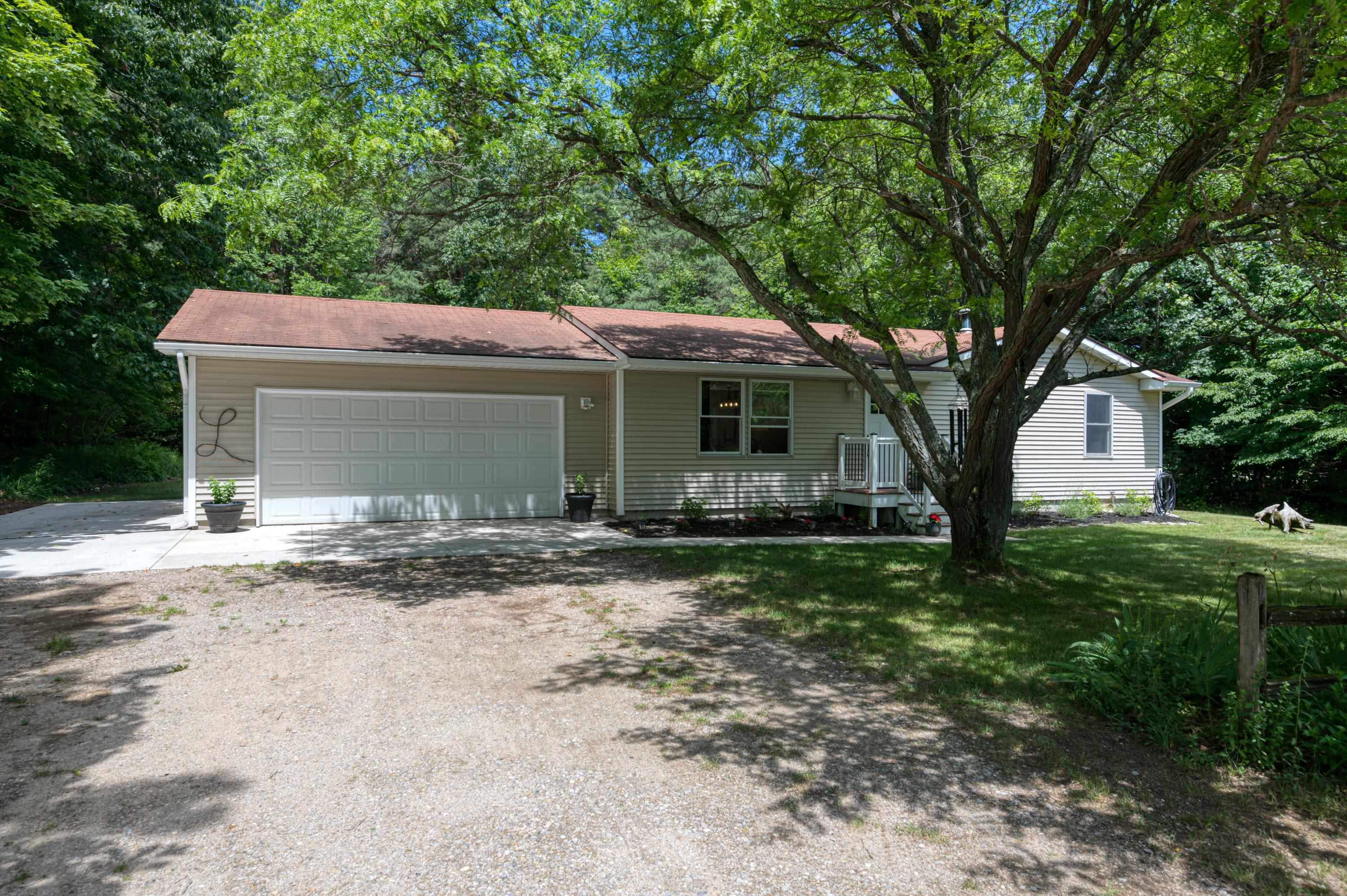 10458 Cedar Run Road Traverse City, MI 49684 - Photo 7 of 36 1923913-58b240bd-2450-46a3-aab8-32f23f4fa3e2.JPG