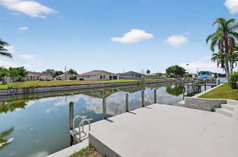 a view of a lake with a house