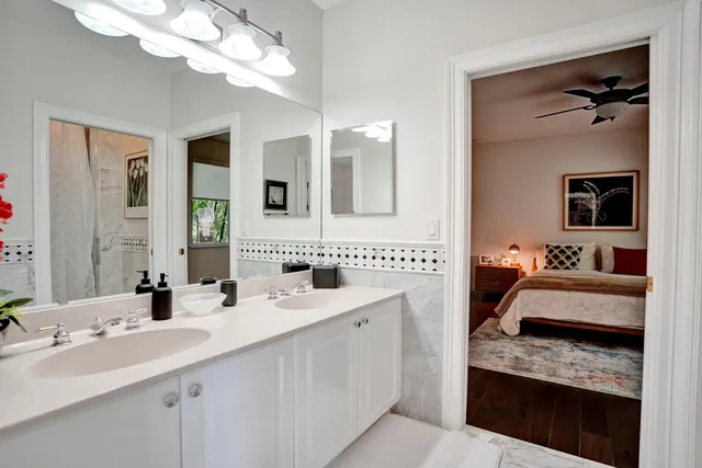 a view of a backyard with large trees