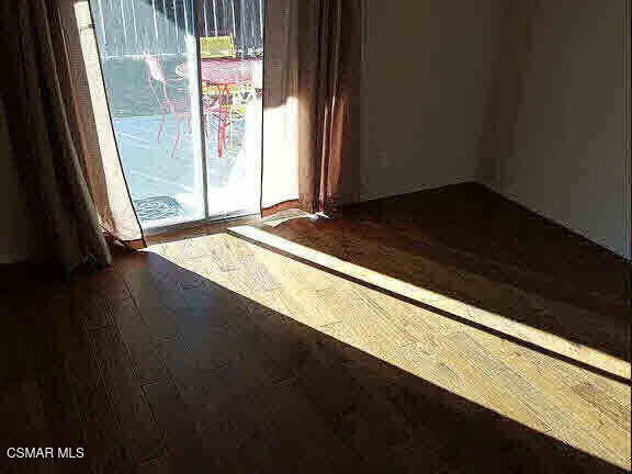 1625 Sequoia Avenue Simi Valley, CA 93063 - Photo 15 of 19 a view of a closet area with wooden floor