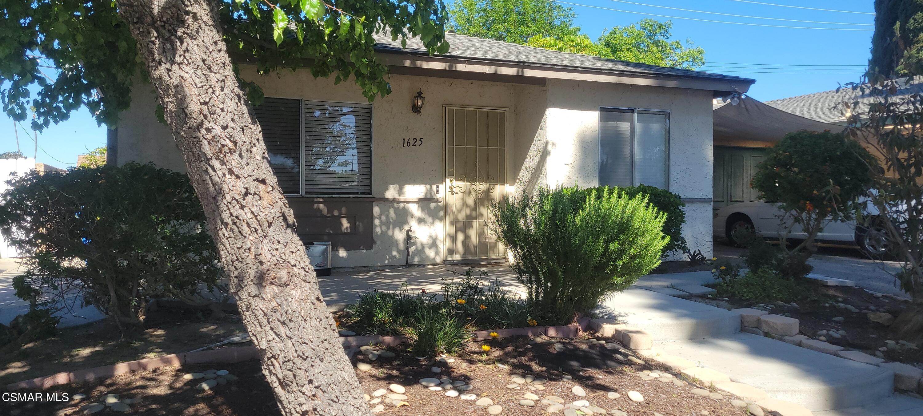 1625 Sequoia Avenue Simi Valley, CA 93063 - Photo 2 of 19 a front view of a house with garden