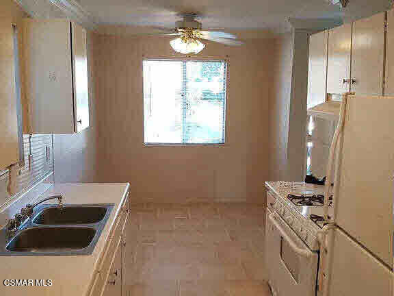 1625 Sequoia Avenue Simi Valley, CA 93063 - Photo 9 of 19 a kitchen that has a sink and a stove