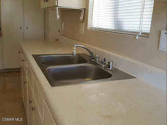 1625 Sequoia Avenue Simi Valley, CA 93063 - Photo 10 of 19 a utility room with a sink a washer and dryer