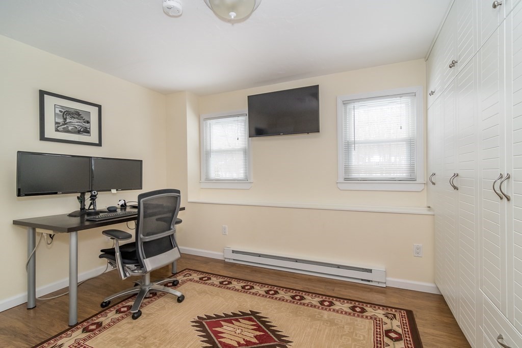 136 Parker Road Framingham, MA 01702 - Photo 19 of 32 a workspace with furniture and window