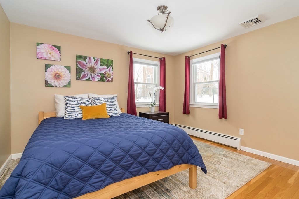 136 Parker Road Framingham, MA 01702 - Photo 23 of 32 a bedroom with a bed and window