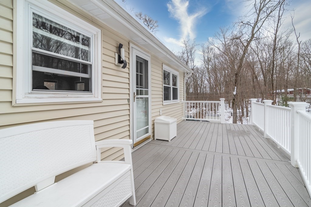 136 Parker Road Framingham, MA 01702 - Photo 25 of 32 a view of a house with a roof deck