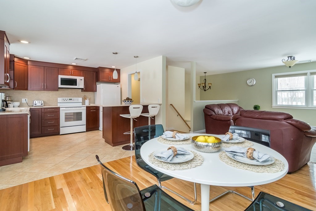 136 Parker Road Framingham, MA 01702 - Photo 7 of 32 a open dining room with furniture and window
