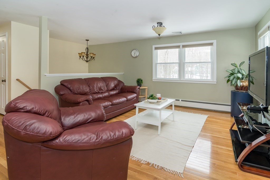 136 Parker Road Framingham, MA 01702 - Photo 9 of 32 a living room with furniture and a window