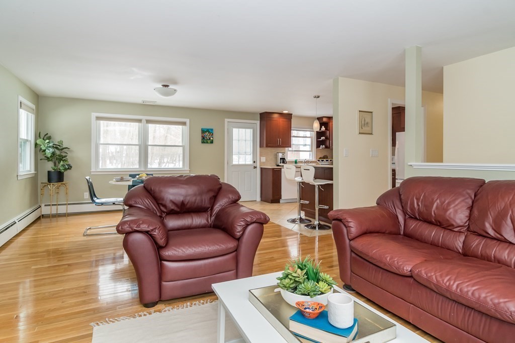 136 Parker Road Framingham, MA 01702 - Photo 10 of 32 a living room with furniture or couch and a flat screen tv