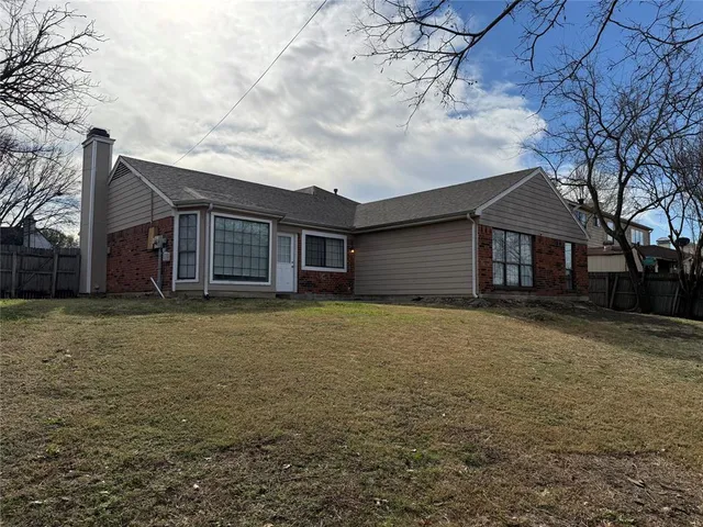 a house view with a garden