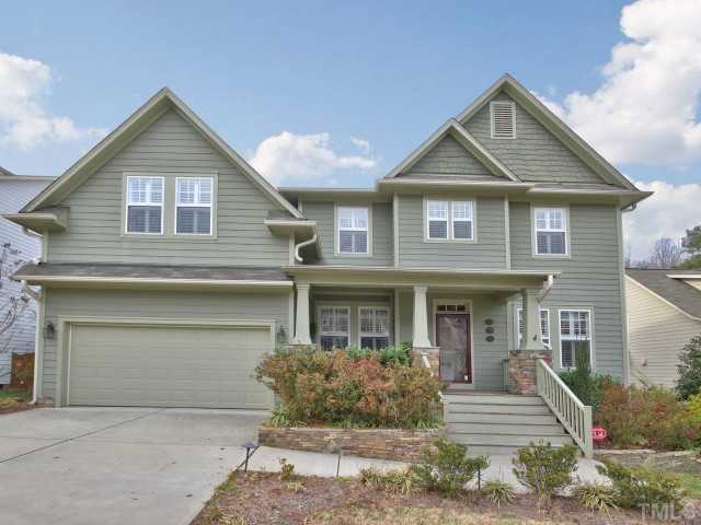 10149 Darling Street Raleigh, NC 27613 - Photo 1 of 25 a front view of a house with garden