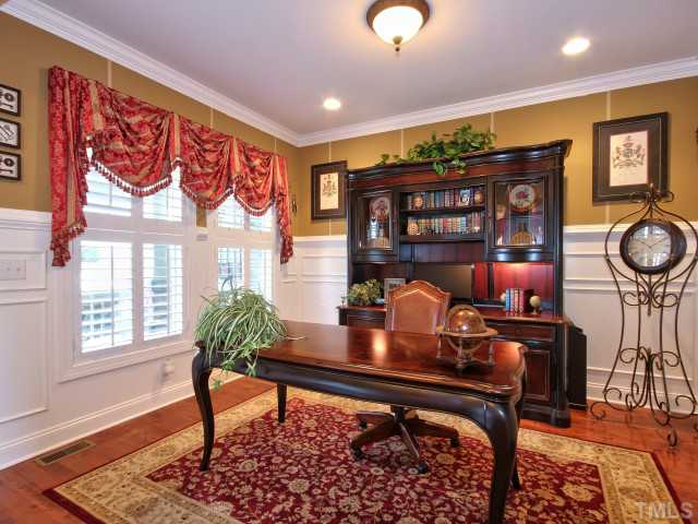 10149 Darling Street Raleigh, NC 27613 - Photo 2 of 25 a living room with furniture and wooden floor